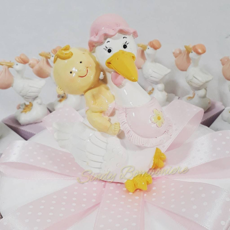Torta battesimo nascita bambina a tema cicogne con bambino con centrale salvadanaio