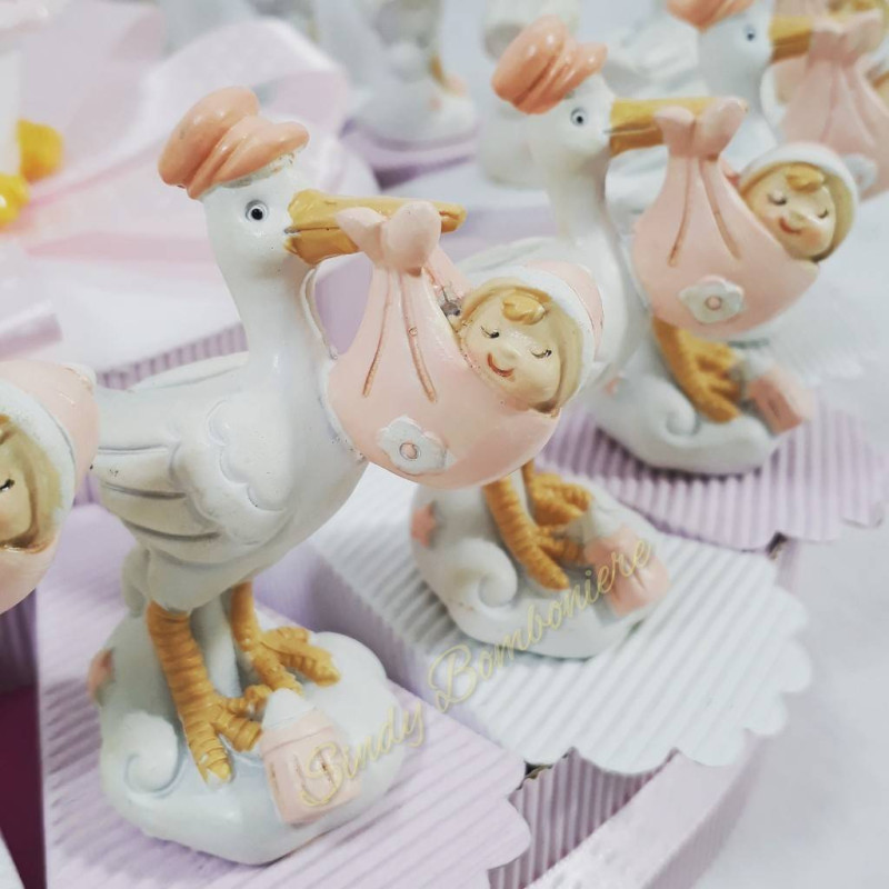 Torta battesimo nascita bambina a tema cicogne con bambino con centrale salvadanaio