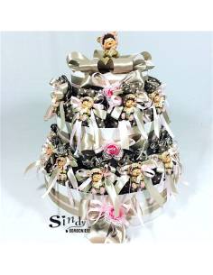 Idee originali per Battesimo bimba su torta bomboniera