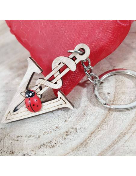 Bomboniere laurea in farmacia portachiavi caduceo