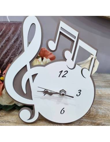Orologio tema musica chiave di violino e note musicali