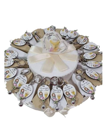 La Torta bomboniera Comunione palloncini frasi ha sulle fette i portachiavi a forma di palloncino