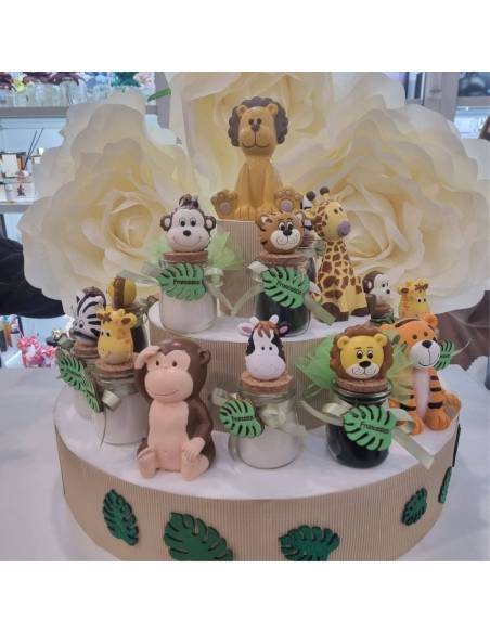 Candele vasetti in vetro con tappo in sughero decorati con nastro e foglia