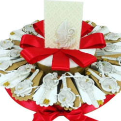 Bomboniere per Cresima su torta con chiave Sacra