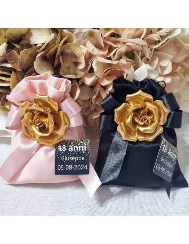 Bomboniere per diciottesimo sacchetti con rose oro calamite
