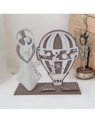 Bomboniere matrimonio utili orologio mongolfiera sposi stilizzati