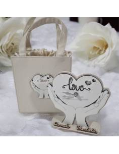 Bomboniere matrimonio orologio cuore in mano scatola borsetta in pelle