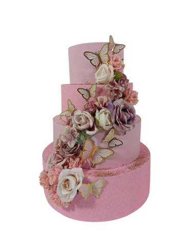 Torta finta scenografica rosa con farfalle e fiori