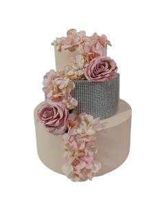 Torta finta scenografica elegante con decoro floreale abbinato