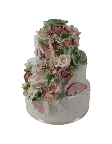Torte finte scenografiche eleganti con decoro floreale e farfalle